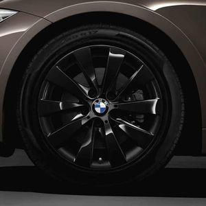 BMW 17 inch Style 413 Black Cold Weather Wheel & Tire Set 36112448006